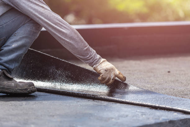 Professional Basement Waterproofing technician working in Arlington, TN